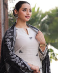 green cotton suit with a beautiful white chikankari design
